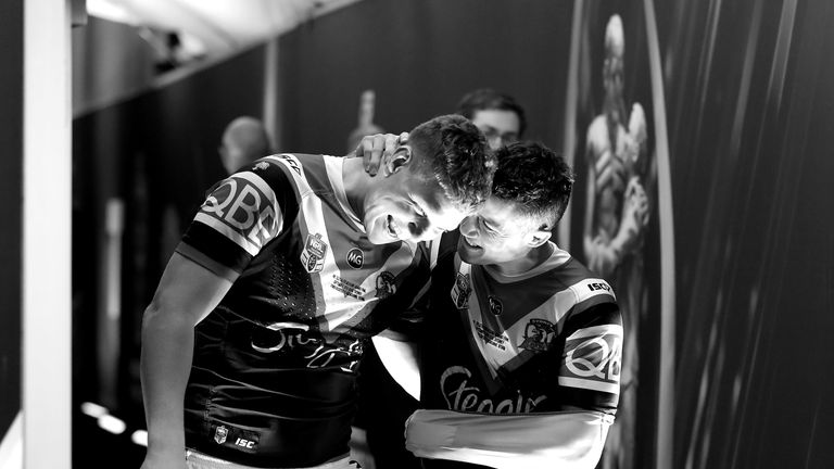 Dylan Napa and Cooper Cronk of the Roosters celebrate victory during the 2018 NRL Grand Final match between the Melbourne Storm and the Sydney Roosters at ANZ Stadium 