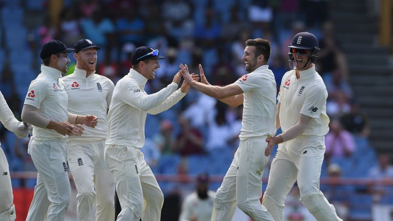 Mark Wood celebrates the wicket of Darren Bravo