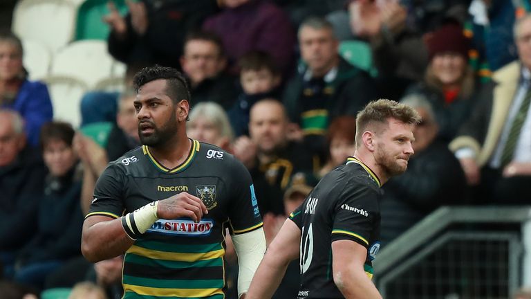 Dan Biggar (R) of Northampton Saints walks off the field after being injured during the Gallagher Premiership Rugby match between Northampton Saints and Sale Sharks at Franklin's Gardens on February 16, 2019 in Northampton, United Kingdom. (