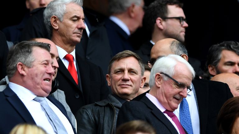 Daniel Craig, centre, has been a frequent spectator at Anfield