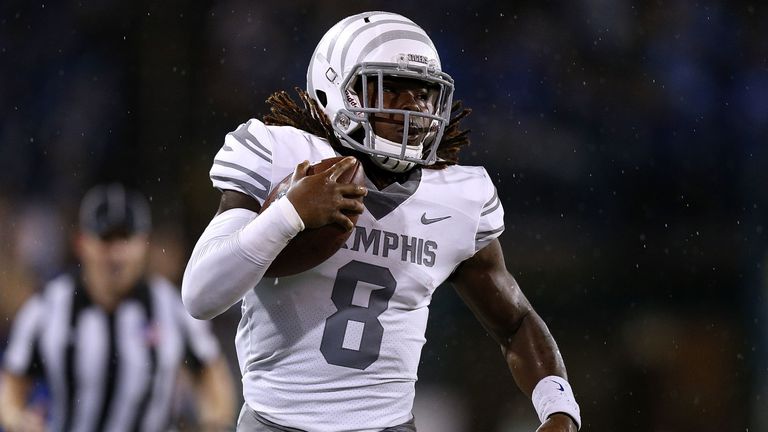 Running back Darrell Henderson of Memphis sprints away from the defense