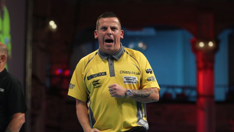 BET VICTOR WORLD MATCHPLAY 2018.WINTER GARDENS,.BLACKPOOL.PIC;LAWRENCE LUSTIG.ROUND 2.DAVE CHISNALL IN ACTION.