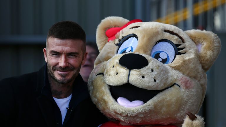 David Beckham meets the Salford mascot ahead of kick-off