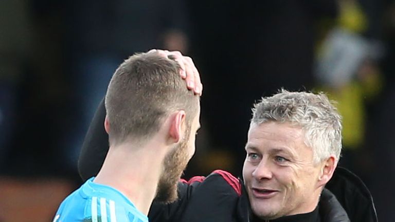 Ole Gunnar Solskjaer congratulates David de Gea after Manchester United's win over Fulham
