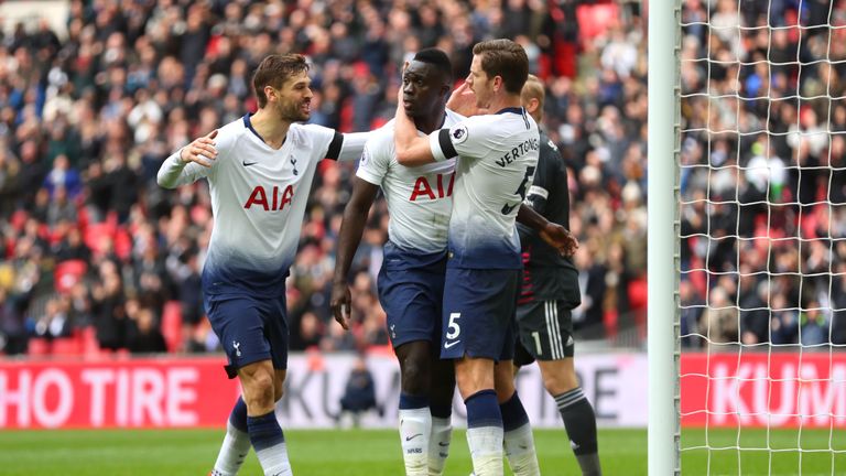 Davinson Sanchez of Tottenham Hotspur celebrates with team-mates after scoring against Leicester