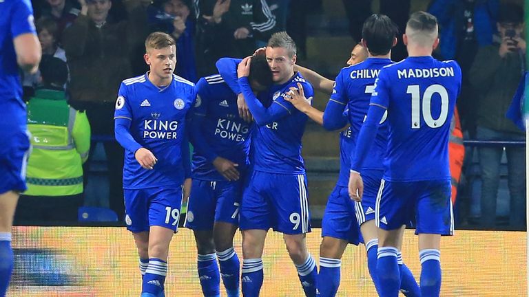 Demarai Gray (2nd L) celebrates with team-mates as Leicester take a 1-0 lead