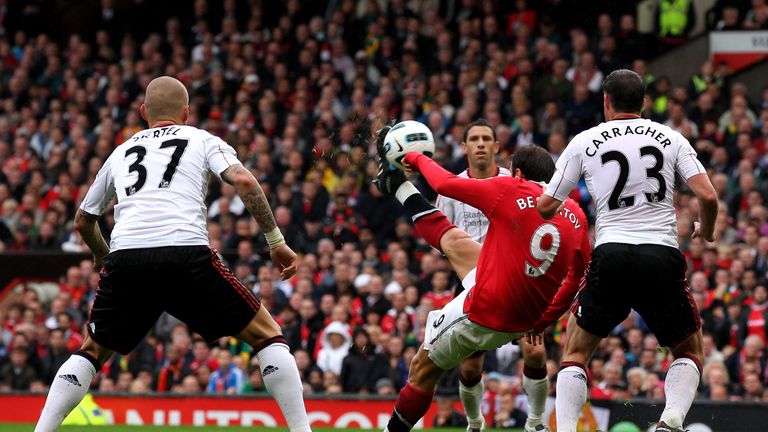 Dimitar Berbatov sends a brilliant overhead kick goalwards as he scored a hat-trick for Manchester United against Liverpool