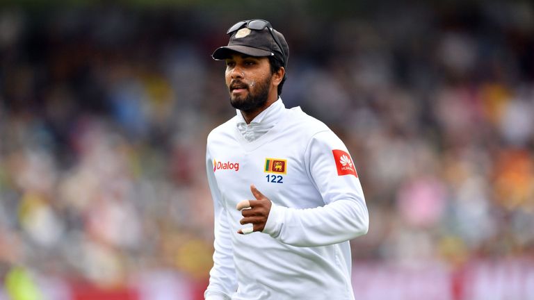 Sri Lanka's captain Dinesh Chandimal runs to stop a ball during day two of the second Test cricket match between Australia and Sri Lanka at the Manuka Oval Cricket Ground in Canberra on February 2, 2019.