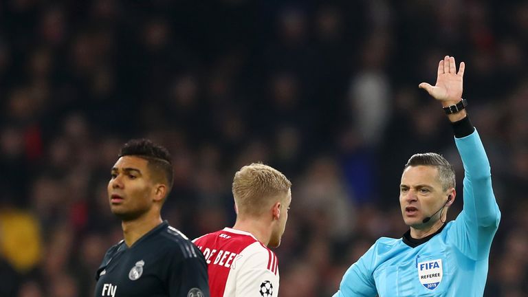 Referee Damir Skomina speaks to Donny van de Beek of Ajax about why the Ajax's goal was disallowed