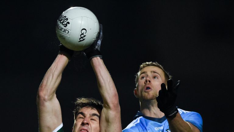 Brian Ó Beaglaíoch and Paul Mannion compete for possession