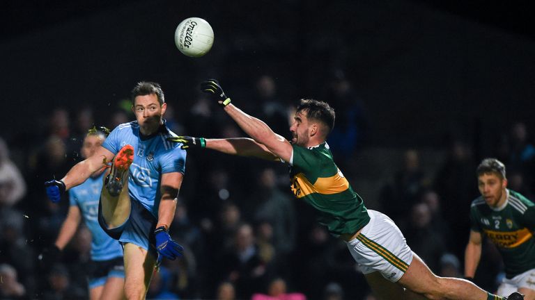 Dean Rock of Dublin is blocked by Jason Foley of Kerry 