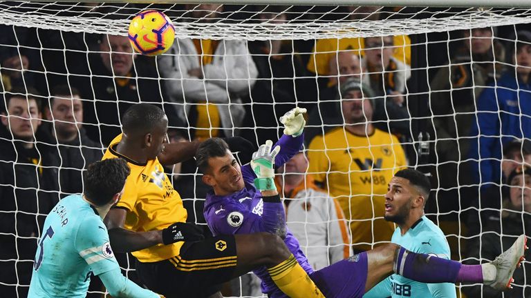 Willy Boly of Wolverhampton Wanderers outjumps goalkeeper Martin Dubravka of Newcastle United as he scores his team&#39;s first goal during the Premier League match between Wolverhampton Wanderers and Newcastle United at Molineux on February 11, 2019 in Wolverhampton, United Kingdom.