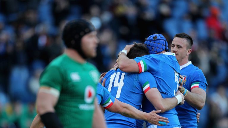 Edoardo Padovani of Italy (L) celebrates scoring their first try with his team-mates