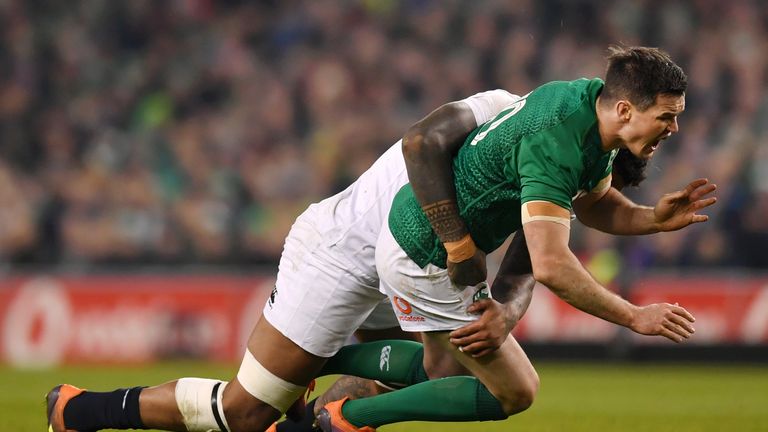 England's Courtney Lawes puts in a big hit on Ireland's Johnny Sexton during their 2019 Six Nations clash in Dublin