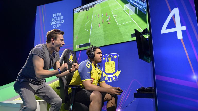 Fatih Fifaustun aka Ustun (R) of Brondby during day one of the FIFA eClub World Cup on May 19, 2018