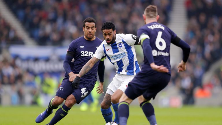 Brighton's Jurgen Locadia is challenged by Derby's Tom Huddlestone