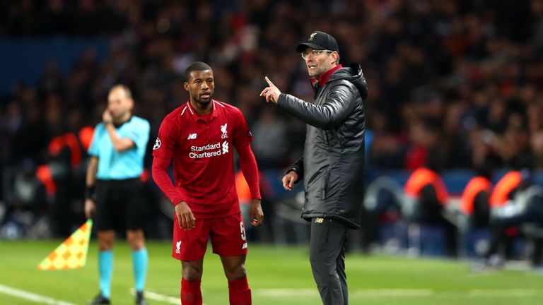Georginio Wijnaldum and Jurgen Klopp during the UEFA Champions League Group C match between Paris Saint-Germain and Liverpool at Parc des Princes on November 28, 2018 in Paris, France.
