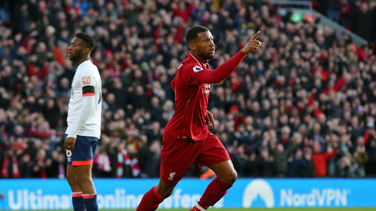 Georginio Wijnaldum celebrates after scoring Liverpool 's second goal