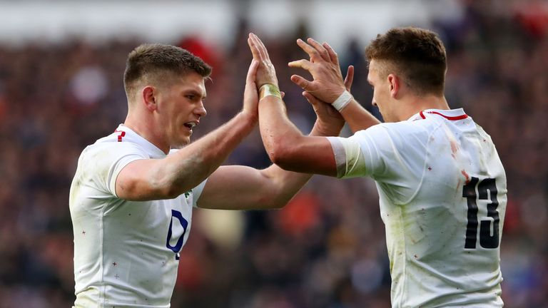 Owen Farrell congratulates Henry Slade after England's fourth try