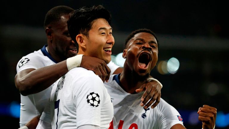 Heung -min Son celebrates with Serge Aurier and Moussa Sissoko after scoring Tottenham's opening goal