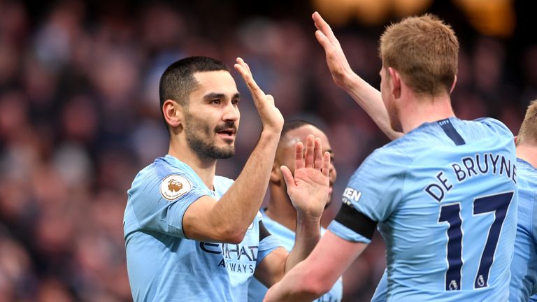 Ilkay Gundogan celebrates scoring Manchester City's fourth against Chelsea