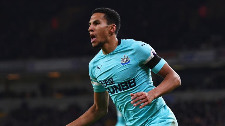 Isaac Hayden celebrates putting Newcastle 1-0 up at Wolves