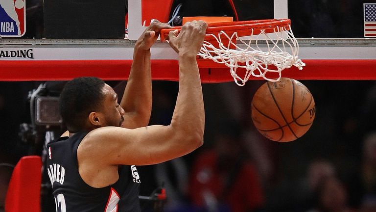 Jabari Parker dunks the ball on his return to Chicago