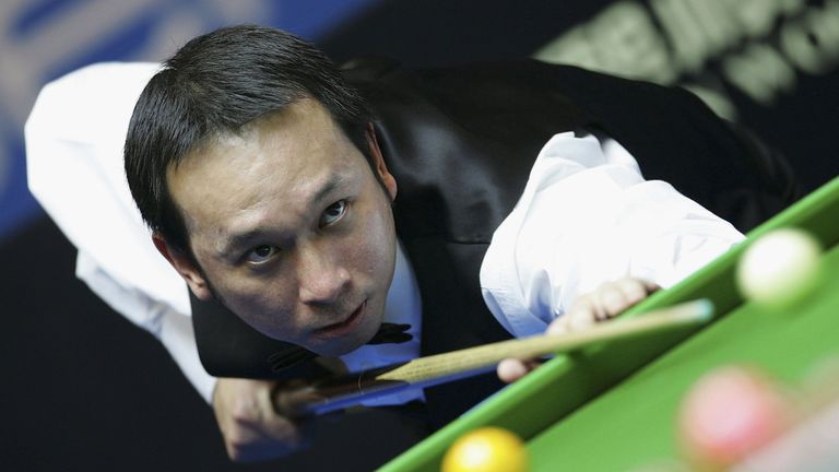 Thailand player James Wattana hits the ball during the first round of China Snooker Open against England player Ronnie O'Sullivan on March 22, 2006 in Beijing, China.