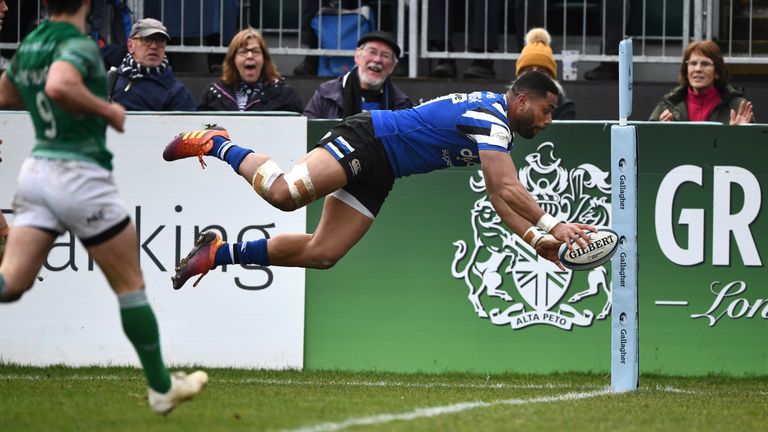 Joe Cokanasiga dives over to score Bath's try against the Newcastle Falcons