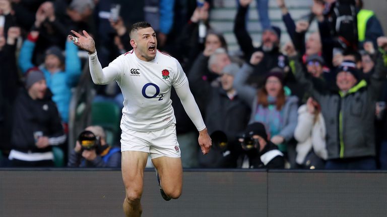 Jonny May celebrates scoring a try for England against France