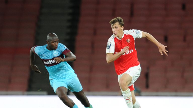 Jordan Brown of West Ham and Krystian Bielik of Arsenal at Emirates Stadium on August 28, 2015 in London, England.