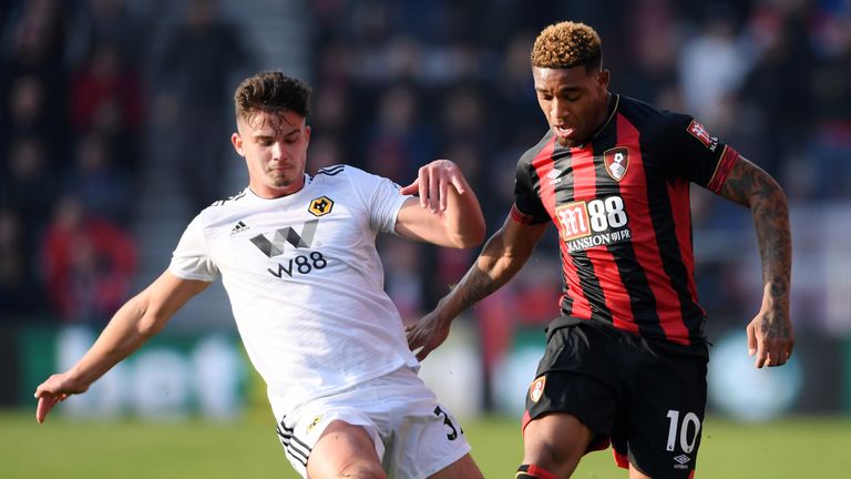 Bournemouth's Jordon Ibe is challenged by Wolves' Leander Dendoncker