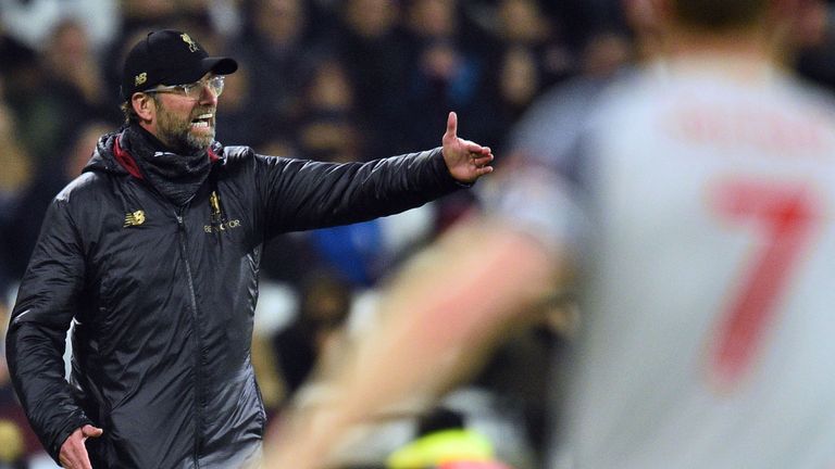 Jurgen Klopp passes on instructions to his players during the Premier League match against West Ham at The London Stadium
