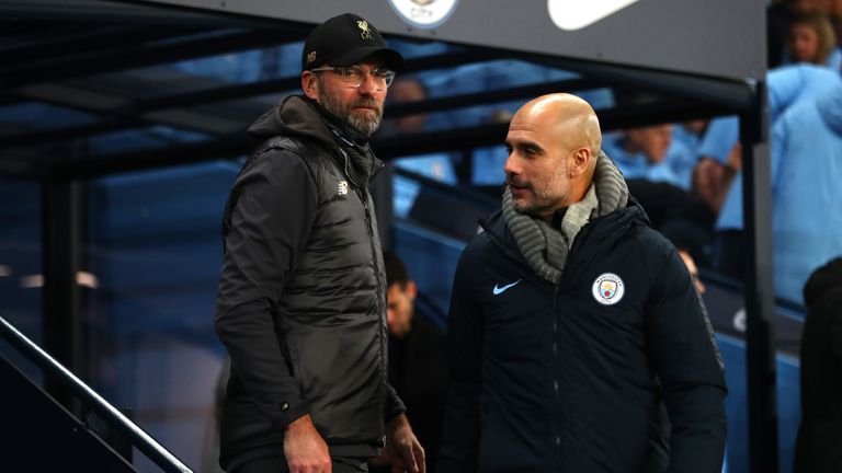 Jurgen Klopp and Pep Guardiola during the Premier League match between Manchester City and Liverpool FC at the Etihad Stadium on January 3, 2019 in Manchester, United Kingdom.