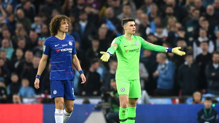 Kepa Arrizabalaga throws his arms out in frustration and refuses to be substituted during the Carabao Cup Final