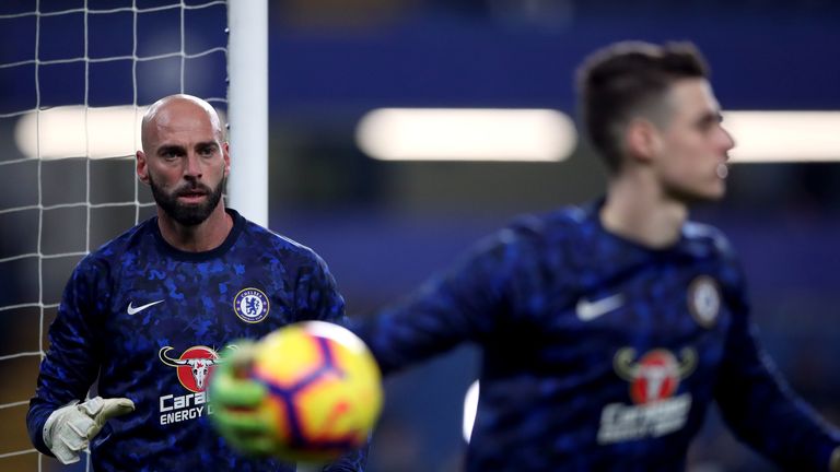 Chelsea goalkeeper Willy Caballero looks on at goalkeeper Kepa Arrizabalaga during the warm up before the Premier League match at Stamford Bridge, London. PRESS ASSOCIATION Photo. Picture date: Wednesday February 27, 2019. See PA story SOCCER Chelsea. Photo credit should read: Nick Potts/PA Wire. RESTRICTIONS: EDITORIAL USE ONLY No use with unauthorised audio, video, data, fixture lists, club/league logos or "live" services. Online in-match use limited to 120 images, no video emulation. No use in betting, games or single club/league/player publications.