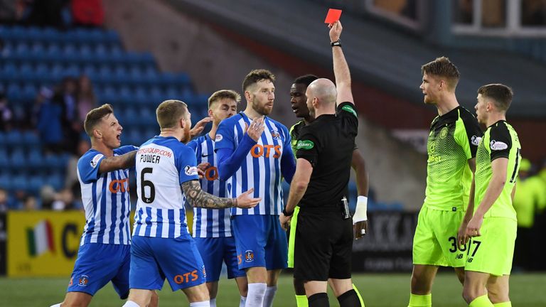 Referee Bobby Madden shows Kilmarnock’s Kirk Broadfoot a red card