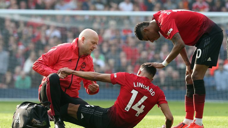 Jesse Lingard injured against Liverpool