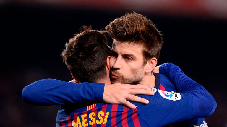 Barcelona's Argentinian forward Lionel Messi (L) celebrates with Barcelona's Spanish defender Gerard Pique after scoring a goal during the Spanish League football match between Barcelona and Leganes at the Camp Nou stadium in Barcelona on January 20, 2019