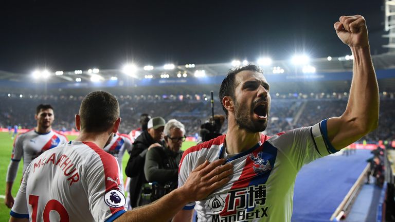  Luka Milivojevic of Crystal Palace celebrates with teammates after scoring his team's third goal during the Premier League match between Leicester City and Crystal Palace at The King Power Stadium on February 23, 2019 in Leicester, United Kingdom