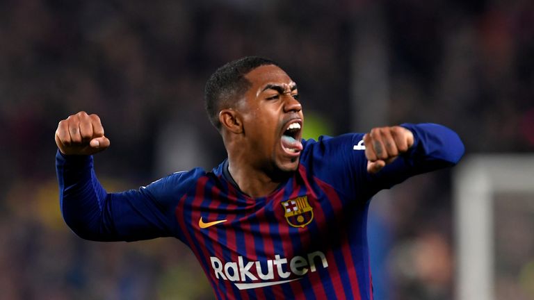 Barcelona&#39;s Brazilian midfielder Malcom celebrates after scoring during the Spanish Copa del Rey (King&#39;s Cup) semi-final first leg football match between FC Barcelona and Real Madrid CF at the Camp Nou stadium in Barcelona on February 6, 2019