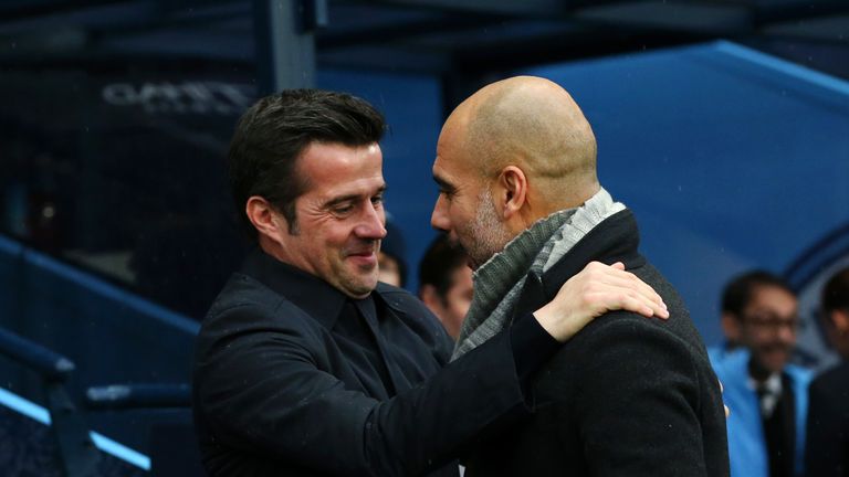 Josep Guardiola, Manager of Manchester City greets Marco Silva, Manager of Everton prior to the Premier League match between Manchester City and Everton FC at Etihad Stadium on December 15, 2018 in Manchester, United Kingdom.
