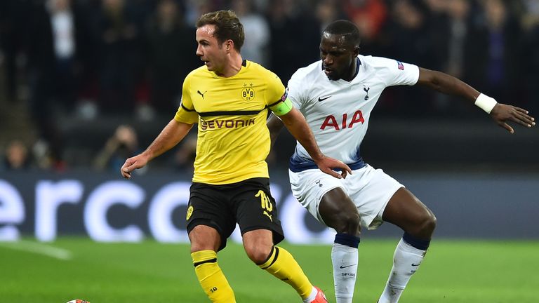Mario Gotze and Moussa Sissoko battle for the ball