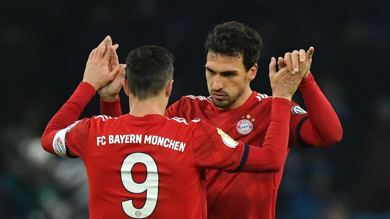 Mats Hummels and Robert Lewandowski of Bayern Munich celebrate during the DFB Cup match between Hertha BSC and FC Bayern Muenchen at Olympiastadion on February 06, 2019 in Berlin, Germany