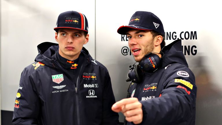 Max Verstappen and Pierre Gasly talk in the garage during Red Bull Racing Filming Day at Silverstone