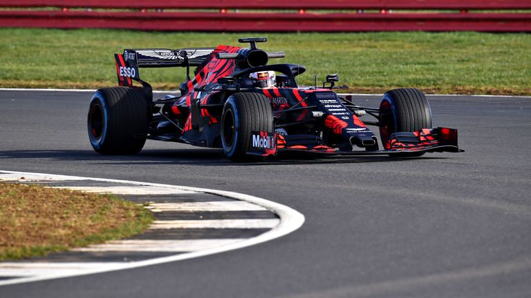 Max Verstappen driving the (33) Aston Martin Red Bull Racing RB15 during Filming Day at Silverstone
