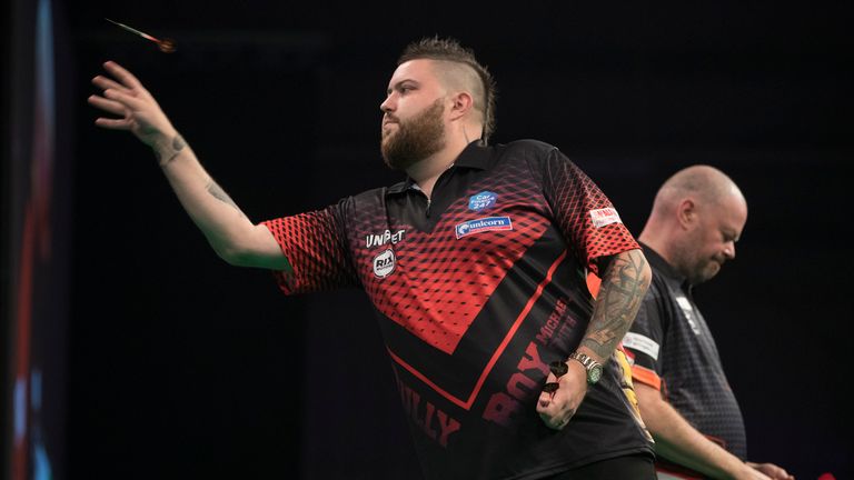 UNIBET PREMIER LEAGUE 2019.WESTPOINT ARENA.EXETER.PIC LAWRENCE LUSTIG.MICHAEL SMITH V RAYMOND VAN BARNEVELD.MICHAEL SMITH IN ACTION