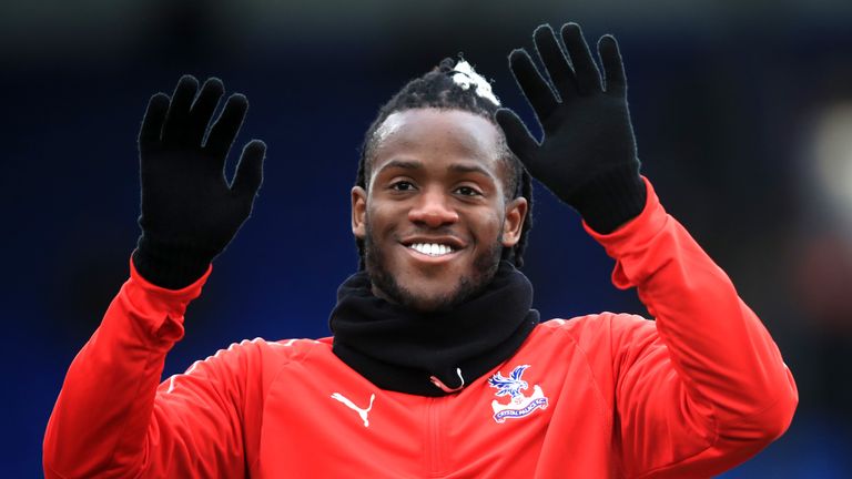 Loan signing Michy Batshuayi acknowledges the fans as he warms up