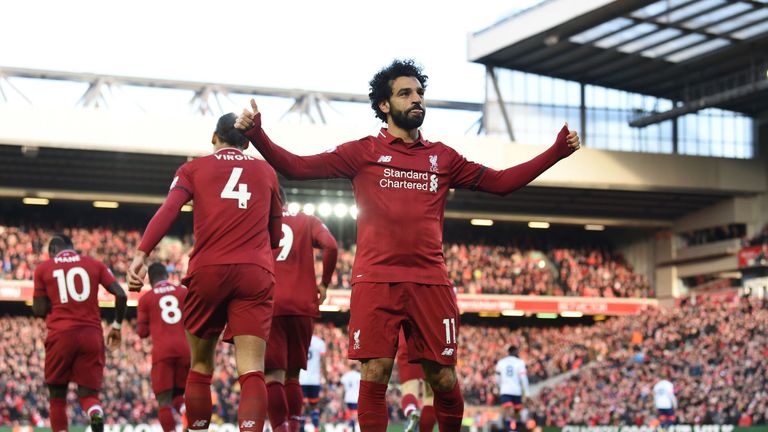 Liverpool's Mohamed Salah scores his side's third goal