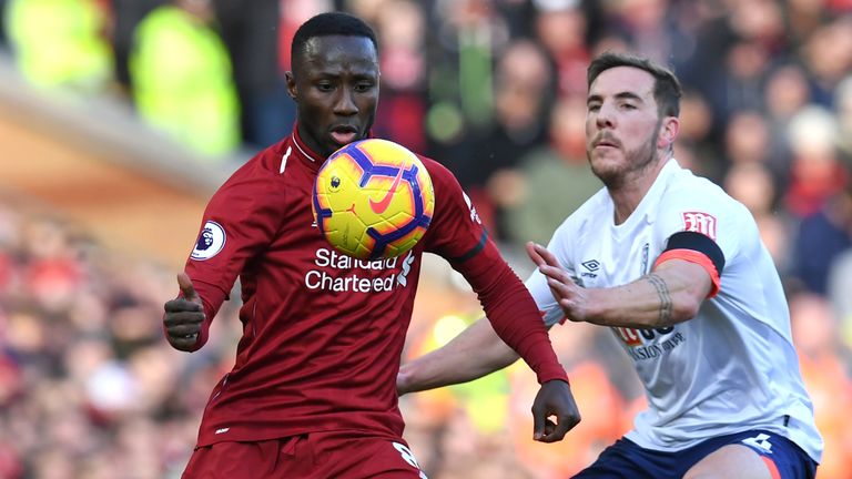 Naby Keita and Dan Gosling compete for possession at Anfield